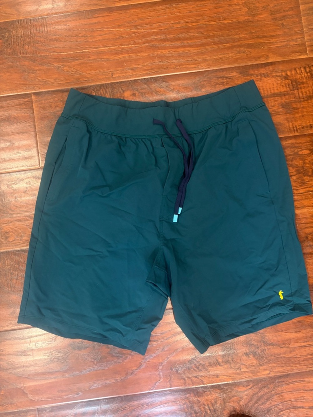 cotopaxi teal athletic shorts size large